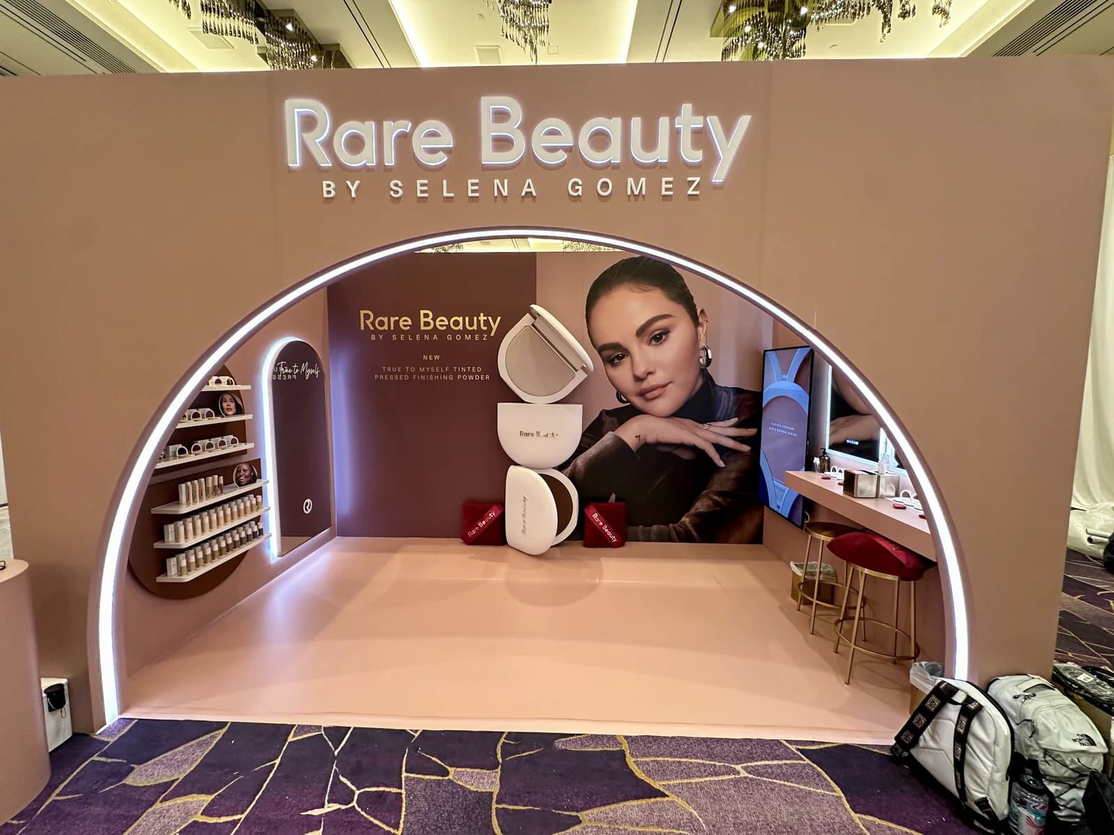Rare Beauty branded experiential installation with large-format graphics and illuminated environmental details