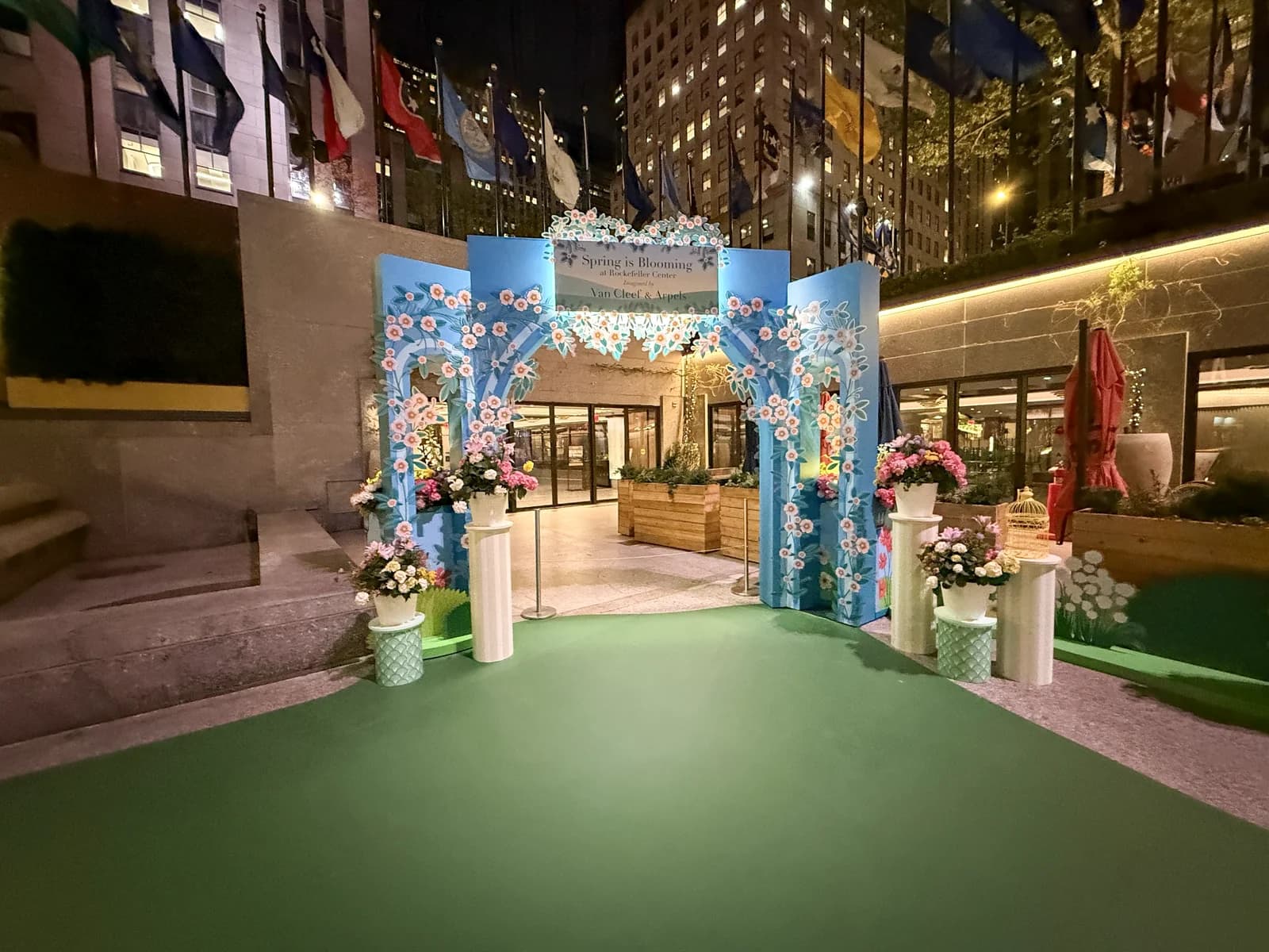 Van Cleef & Arpels branded Rockefeller Center activation with printed environmental graphics