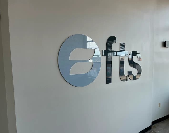 FTS dimensional acrylic wall signage installed by ninety two